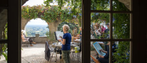 artists painting on a terrace in france