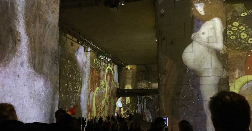 Images of works by Dutch Masters inside the limestone quarry in Southern France