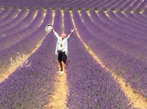 Attendee walking down lavender fields